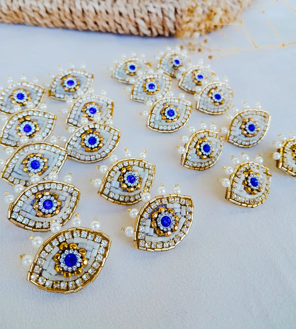 Pearled Eye Stud Earrings